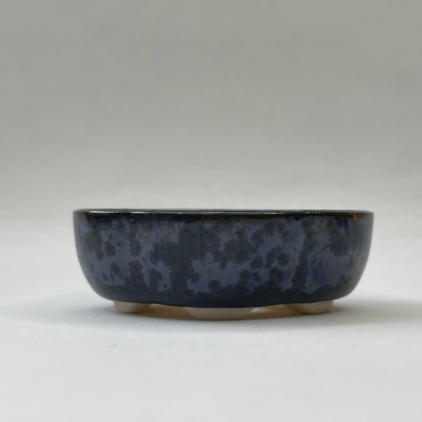 Tiny Rounded Oval Mame Bonsai Pot in Blue Opal, about 1.5 inches wide